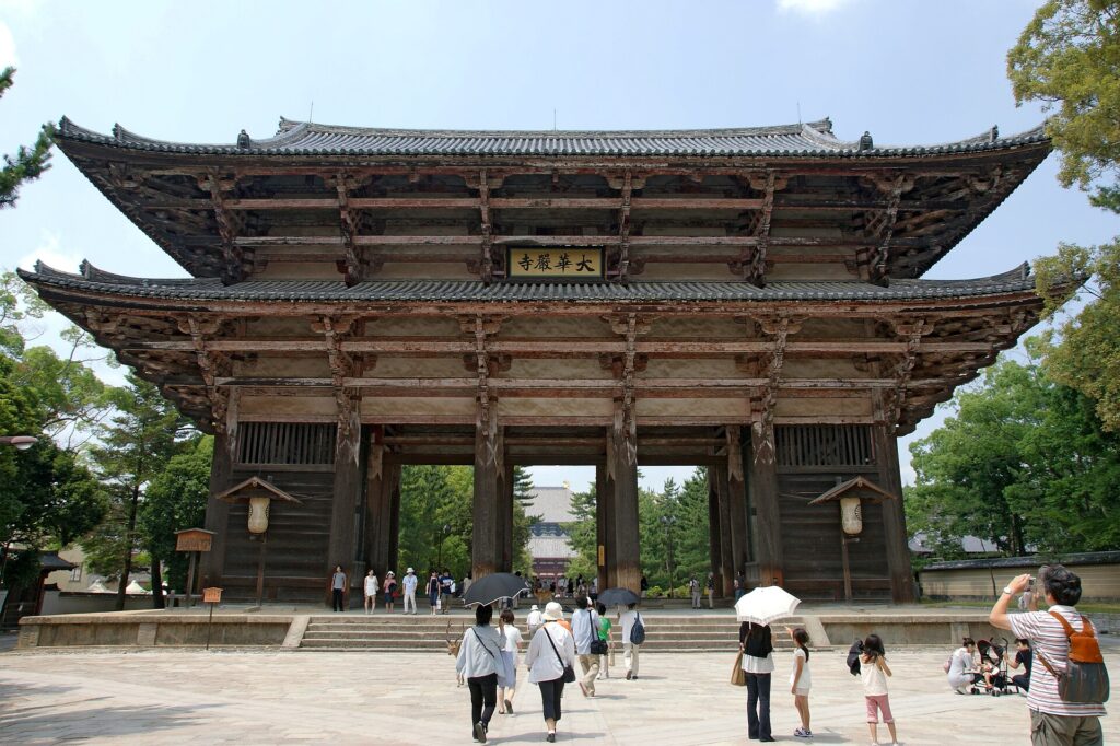People walking along the approach to Todai-ji's Nandaimon gate in Nara