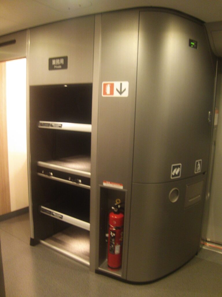 Vertical baggage storage inside an N700S Shinkansen carriage