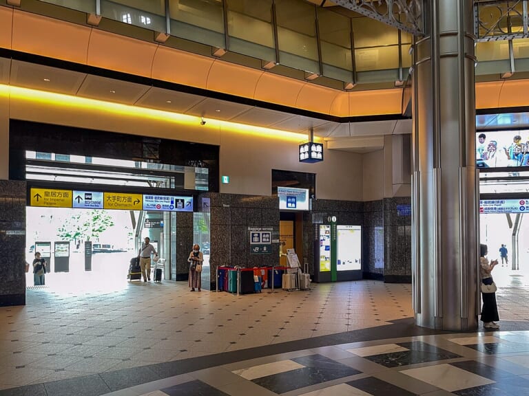 Directional signs inside Tokyo Station