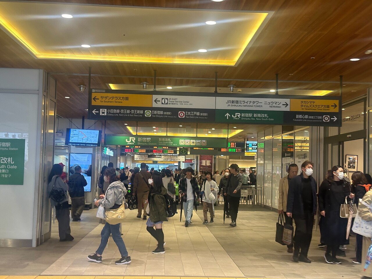 JR Shinjuku Station's New South Gates and nearby direction signs
