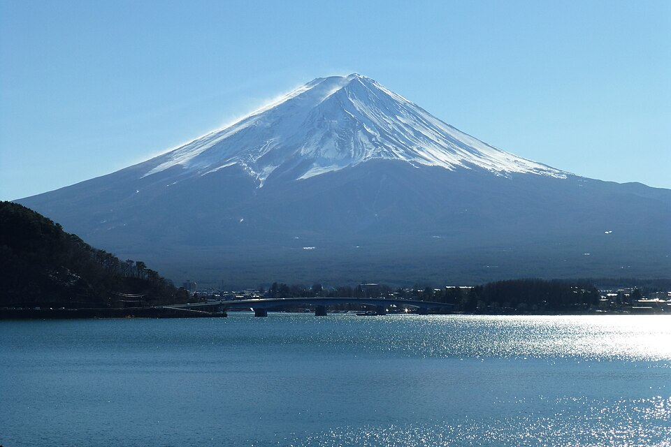 Snow-covered Mount Fuji across Lake Kawaguchi in winter