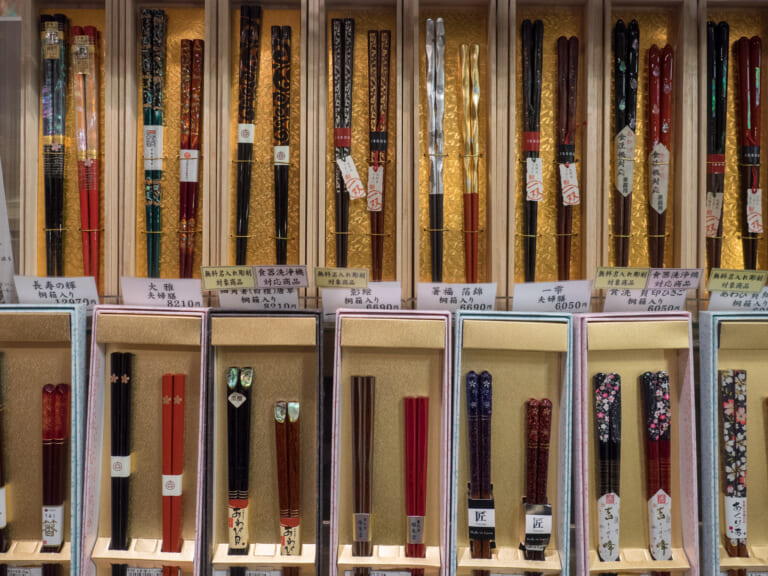 Boxed chopsticks in different colours and patterns on display at Nishiki Market