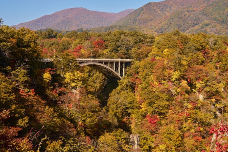 Ofukazawa Bridge spanning Naruko Gorge in autumn