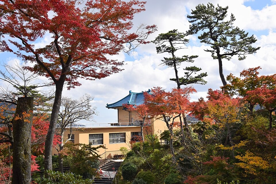 A Hakone ryokan surrounded by autumn trees