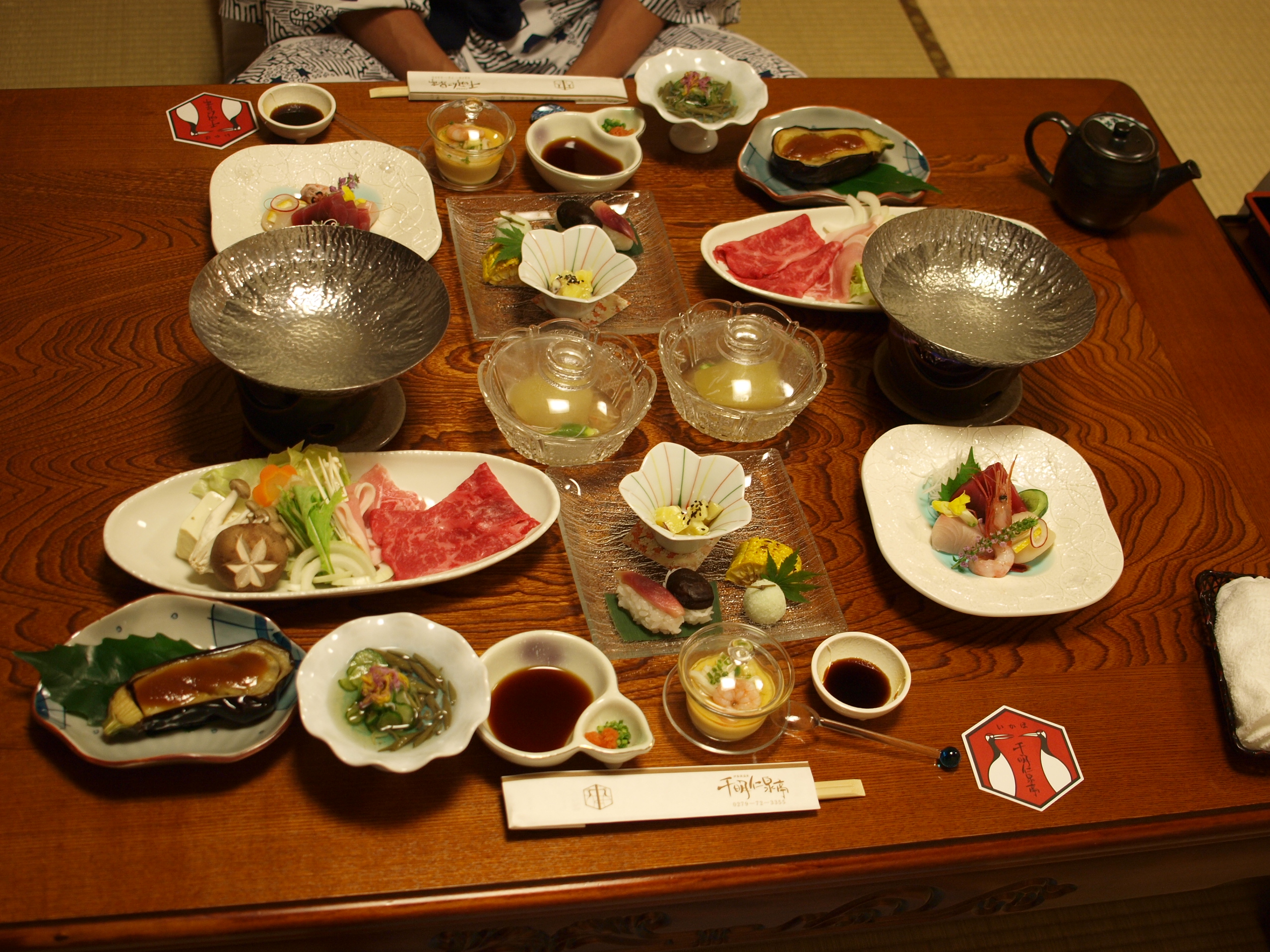 Small dishes and hot pots served for dinner at an Ikaho ryokan
