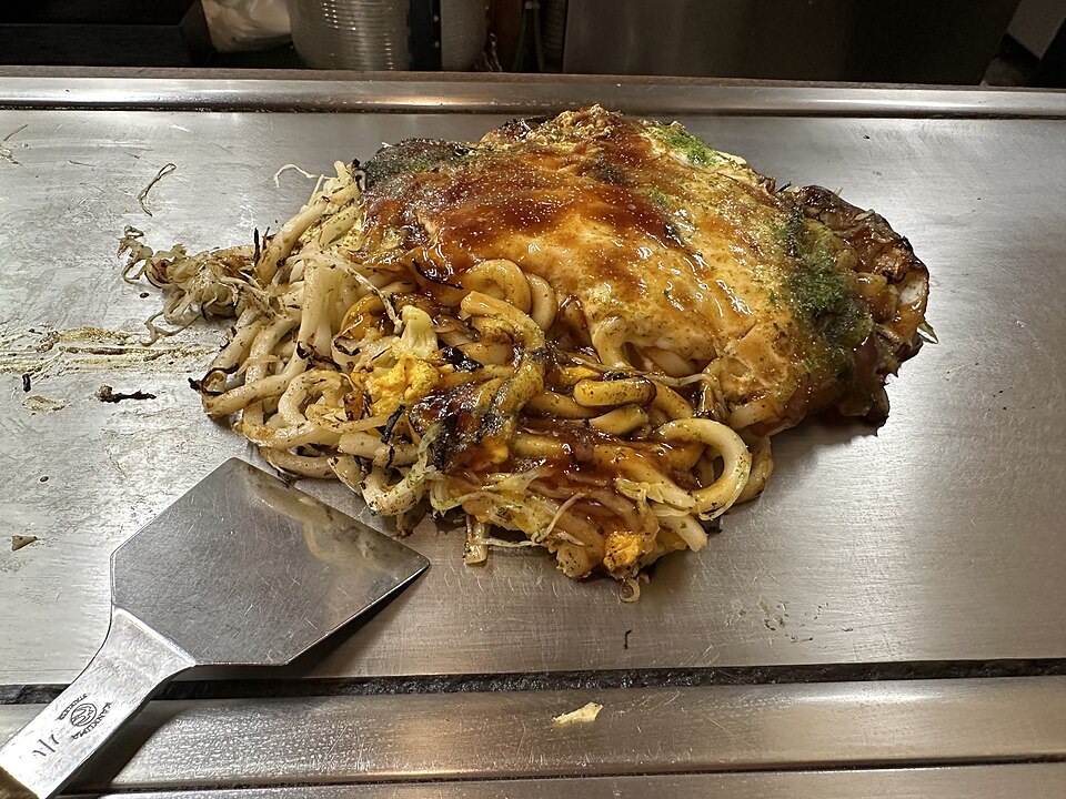 Hiroshima-style okonomiyaki with its noodle layer visible