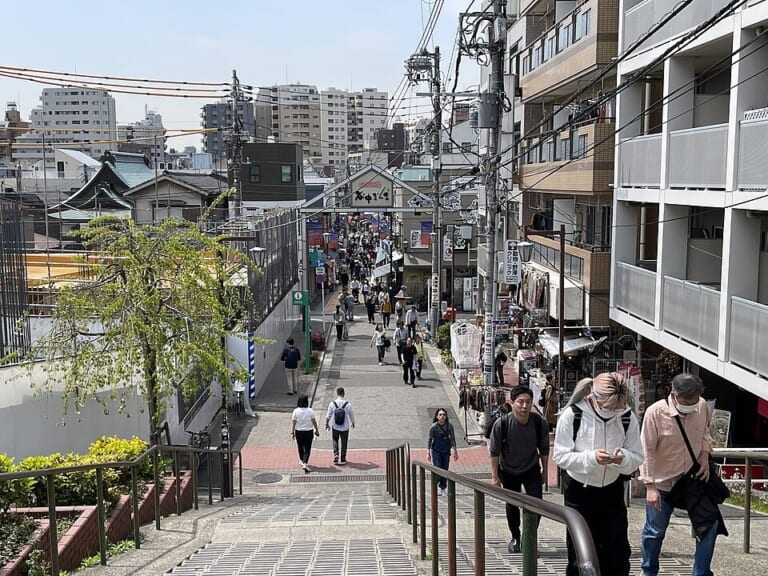 The entrance to Yanaka Ginza seen from the Yuyake Dandan steps