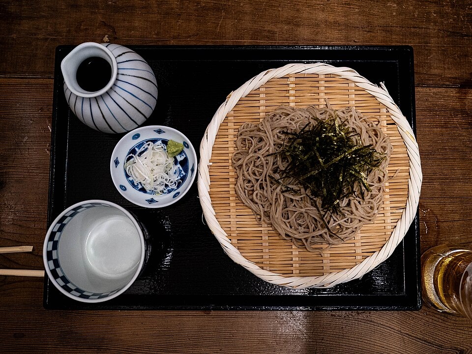 Cold soba served with separate dipping sauce and condiments