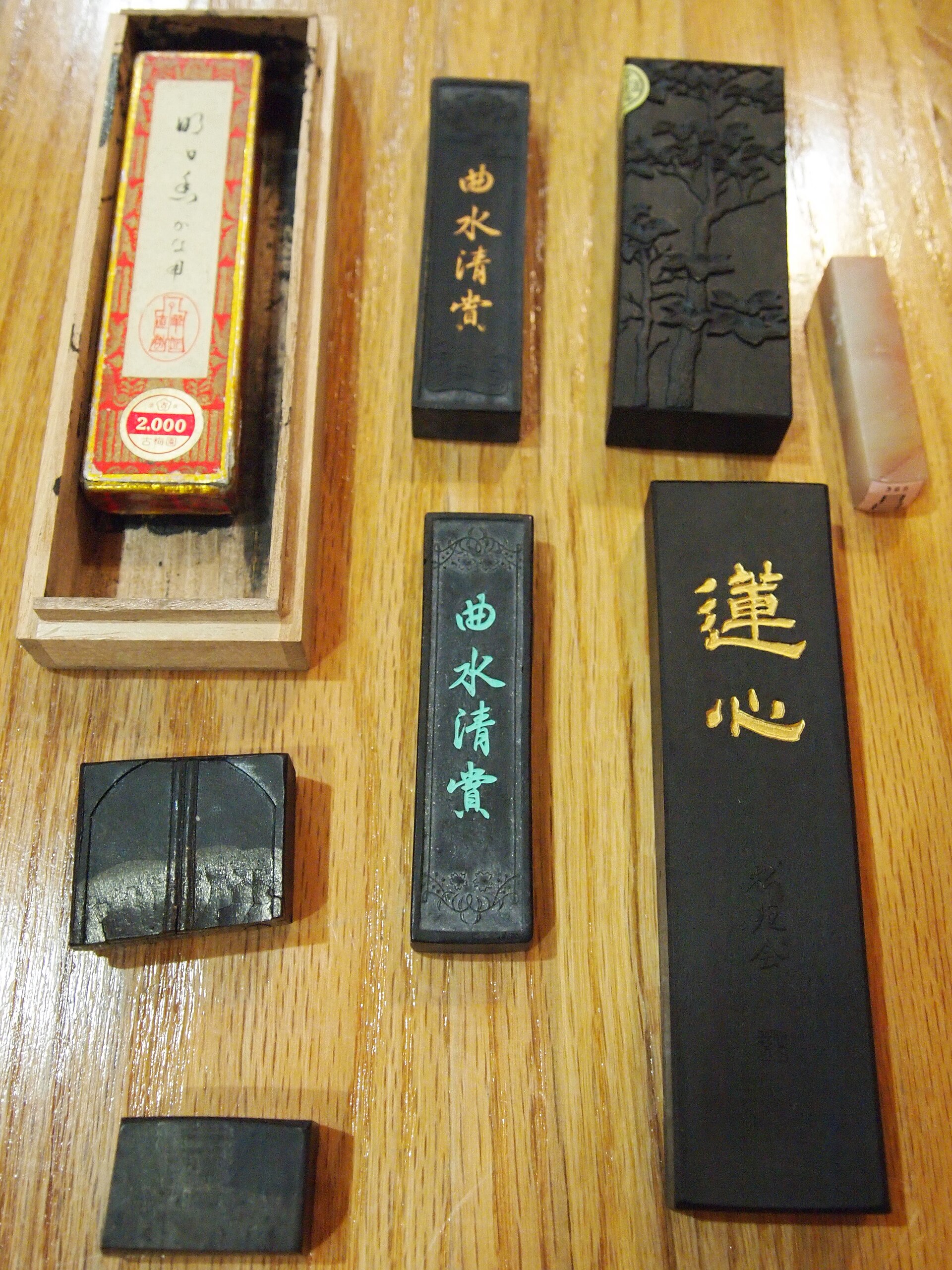 Ink sticks and their boxes used for Japanese calligraphy