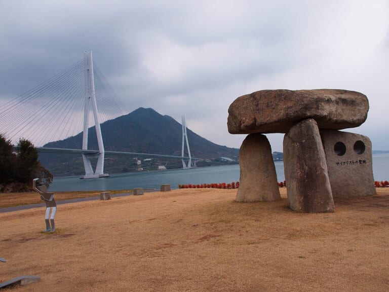 Cyclists’ Sanctuary monument on Omishima with the Tatara Bridge behind