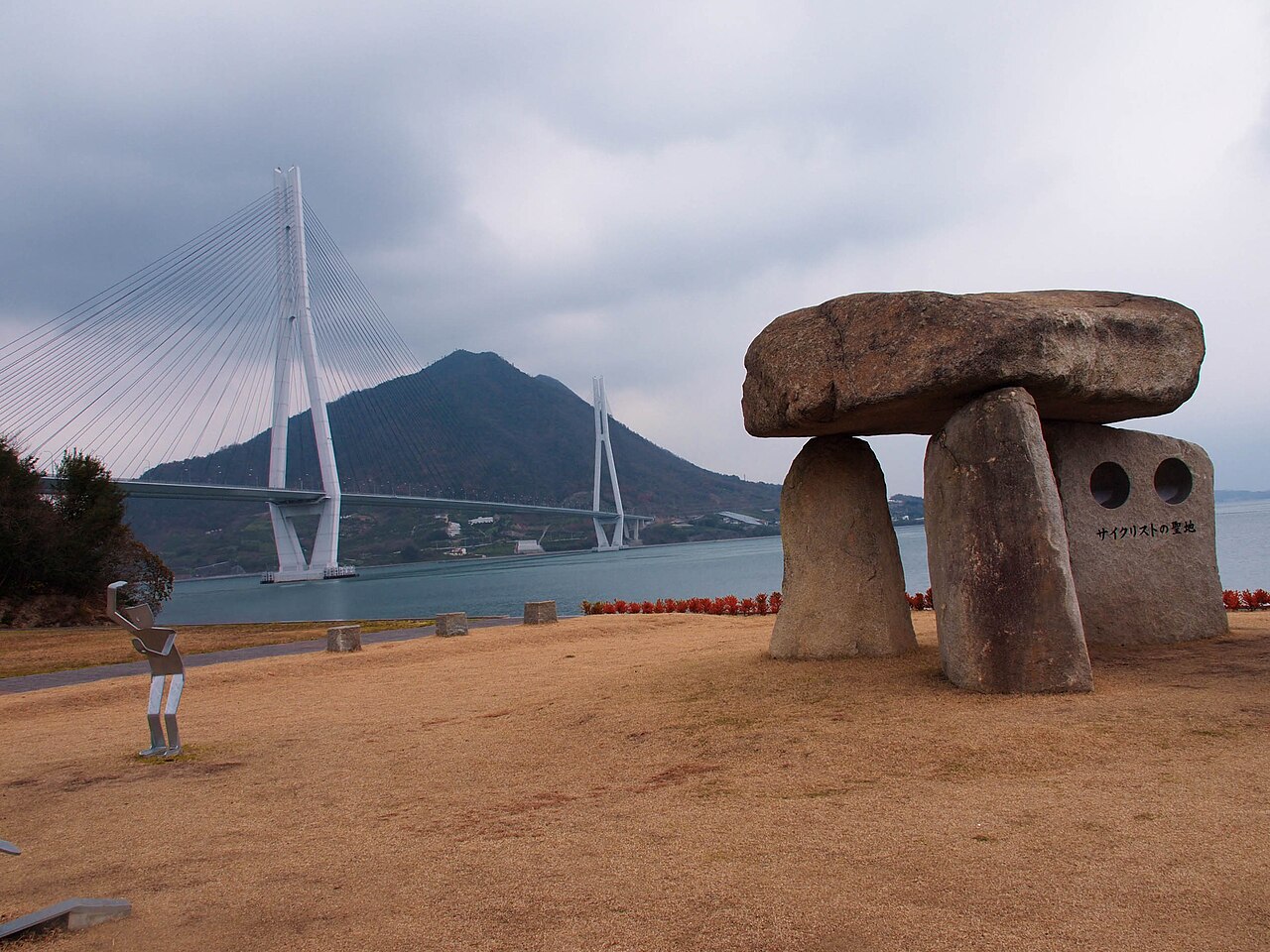 Cyclists’ Sanctuary monument on Omishima with the Tatara Bridge behind