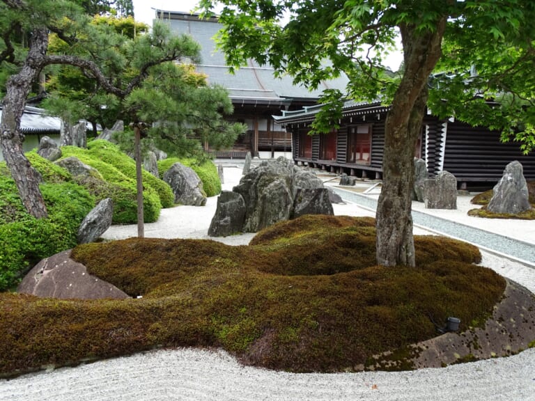 A rock garden and temple buildings at Fukuchi-in in Koyasan